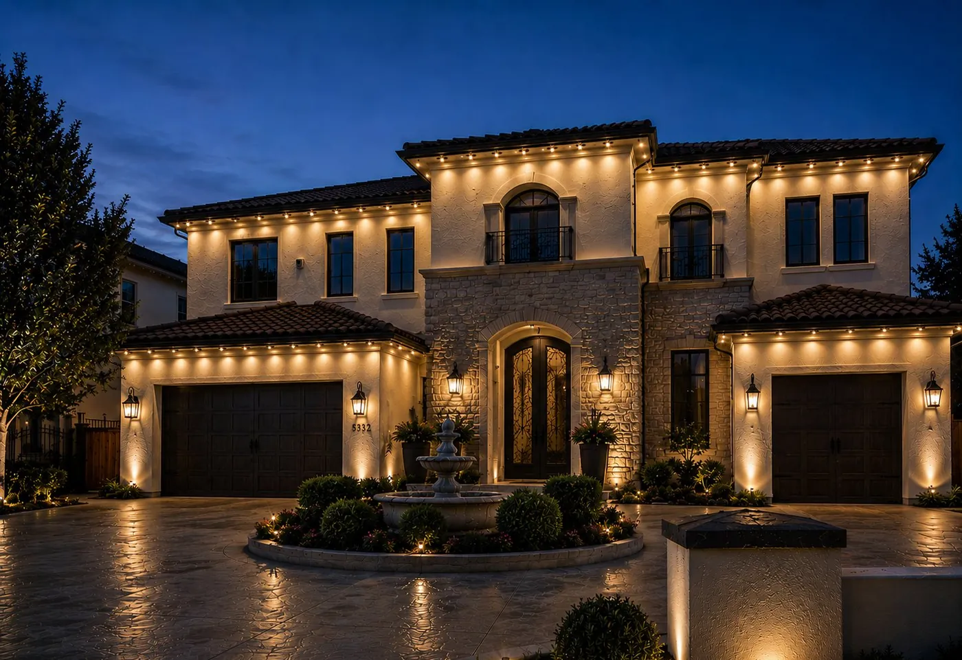 Northern California luxury home with permanent architectural lighting and warm uplighting at dusk